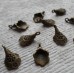 Antique Bronze Charm ~ Curled Flower