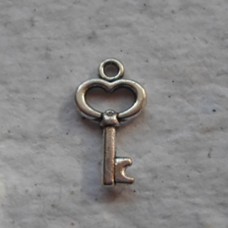Antique Silver ~ Tiny key charm