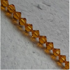 Glass beads ~ Bicone Amber